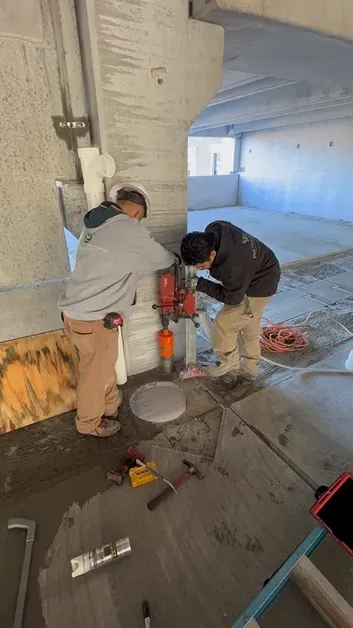 Core drilling work through a concrete slab