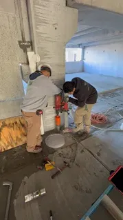 Core drilling work through a concrete slab